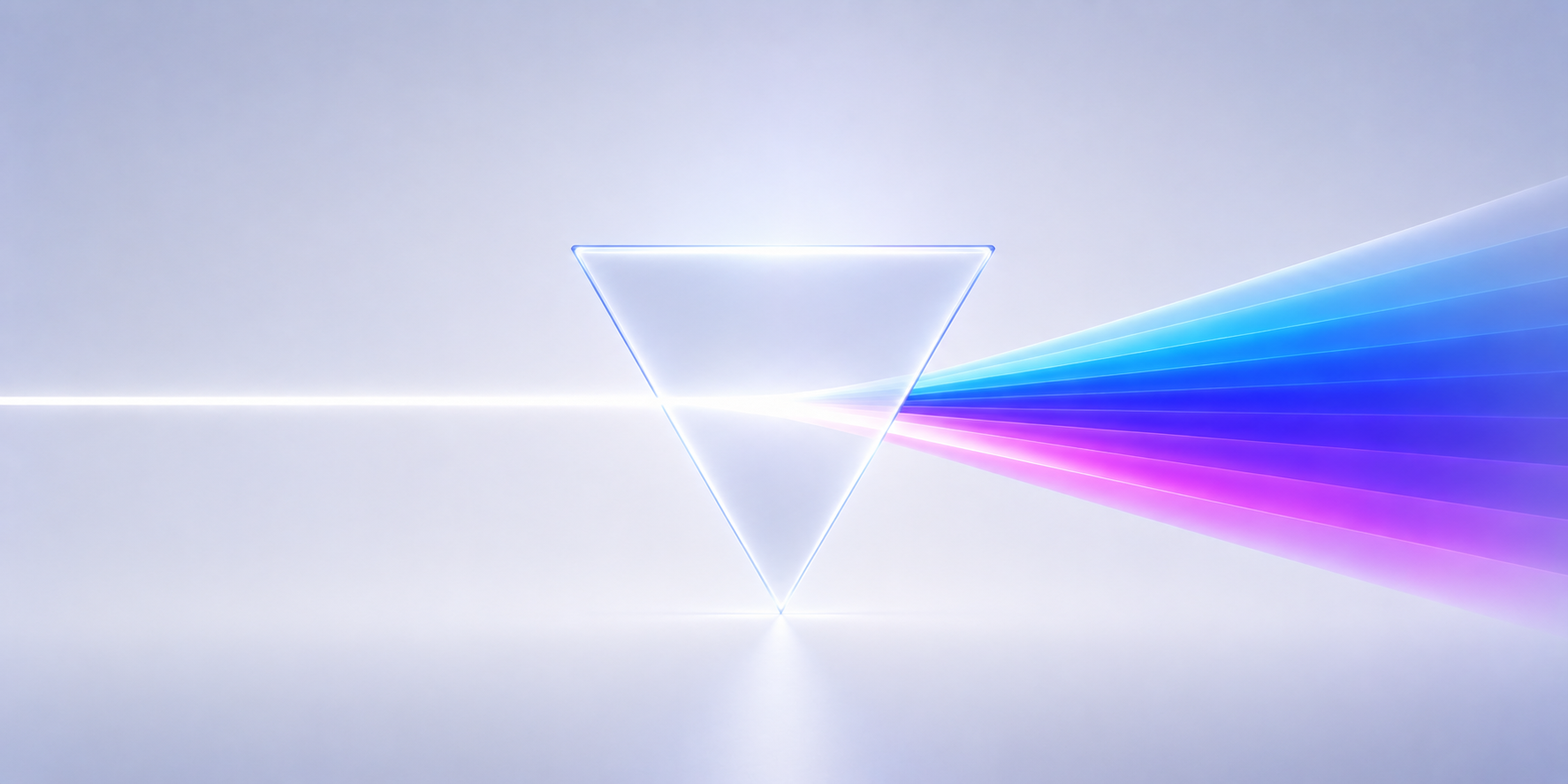 A glass prism refracting a single white beam into a full spectrum